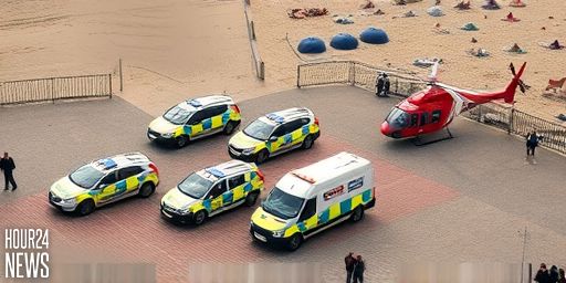 Emergency Response in Weymouth: Coastguard Helicopter Lands as Police and Ambulances Respond to Weymouth Pavilion Incident