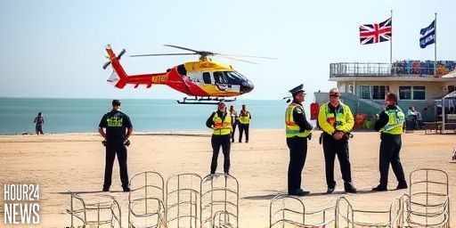 Emergency response at Weymouth Pavilion: Coastguard helicopter lands as incident unfolds