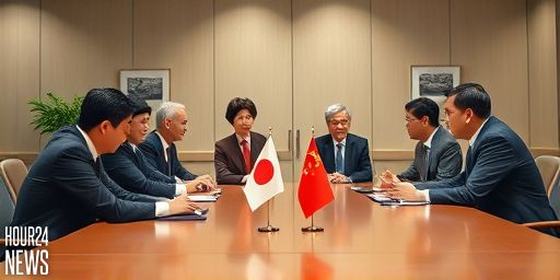 Japan urges China to scale back response in Taiwan row