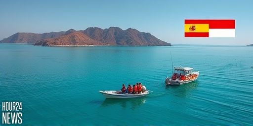 Indonesian rescuers search for Spanish soccer coach and 3 children after tour boat sinks near Komodo island